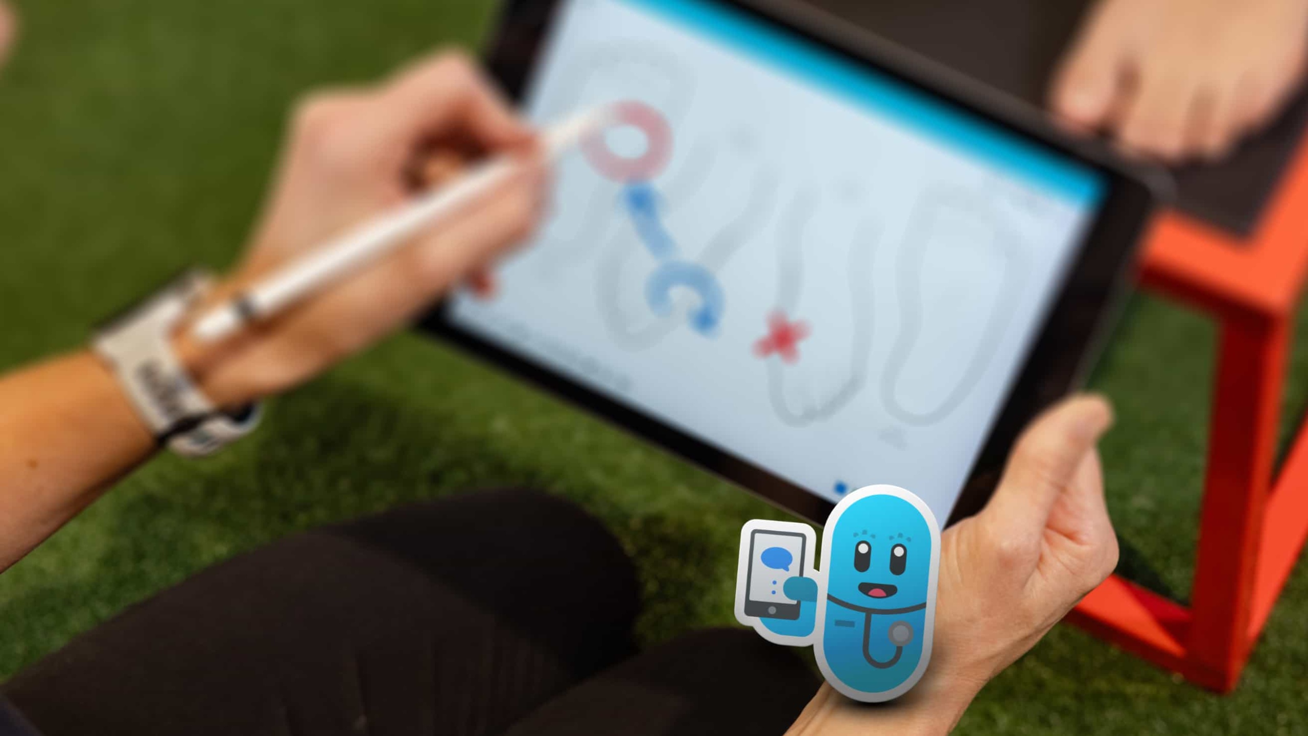 A Therapist Making Notes on a Body Chart on her iPad